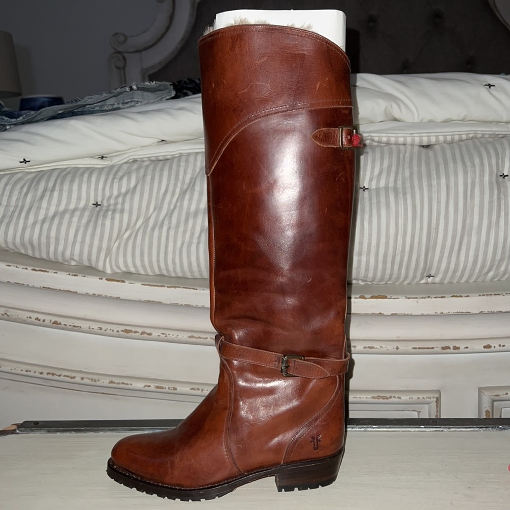 Brand New , Frye knee high riding boots lined with real rabbit fur.